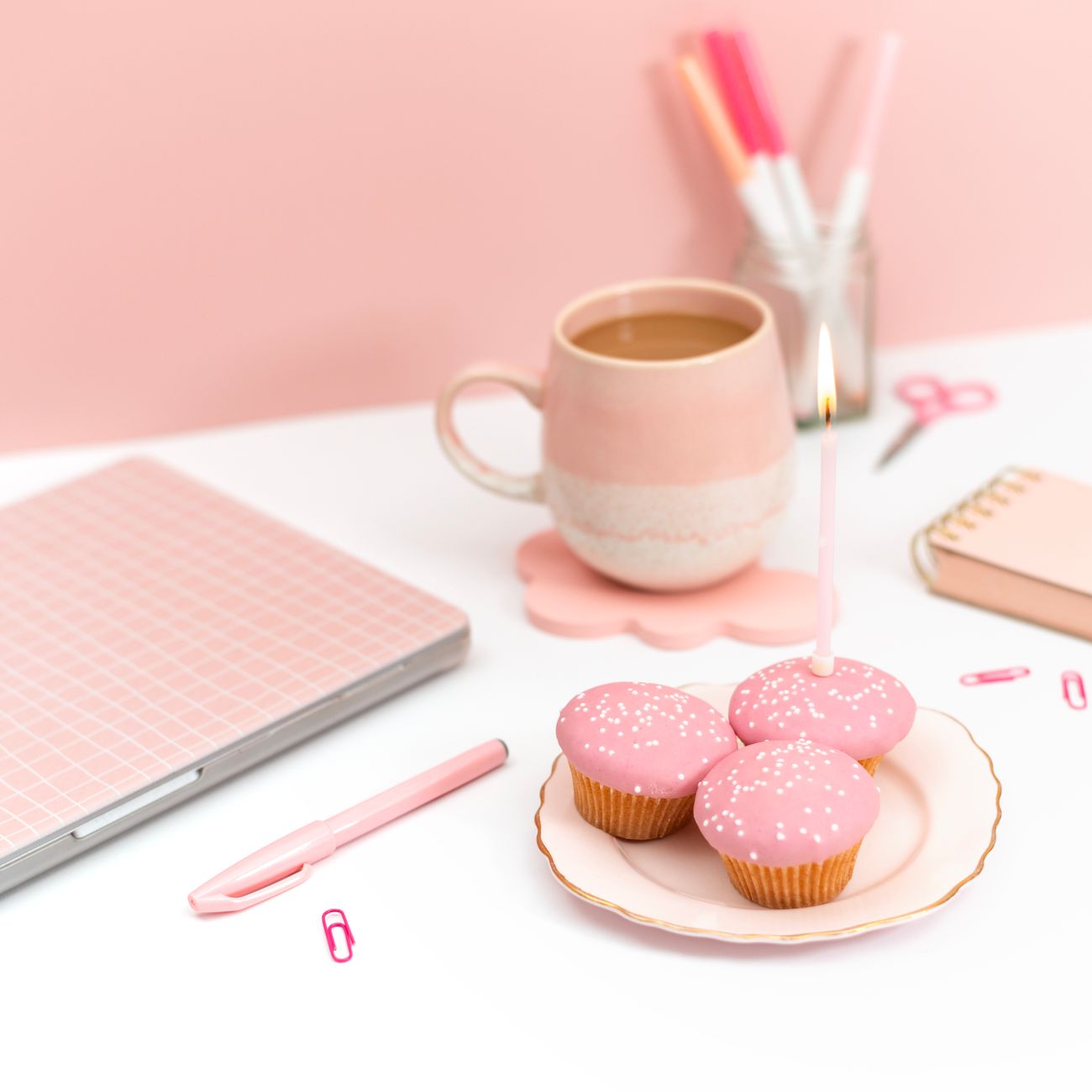 A smiling parent and child reviewing a digital shopping list together on a tablet in a bright kitchen.